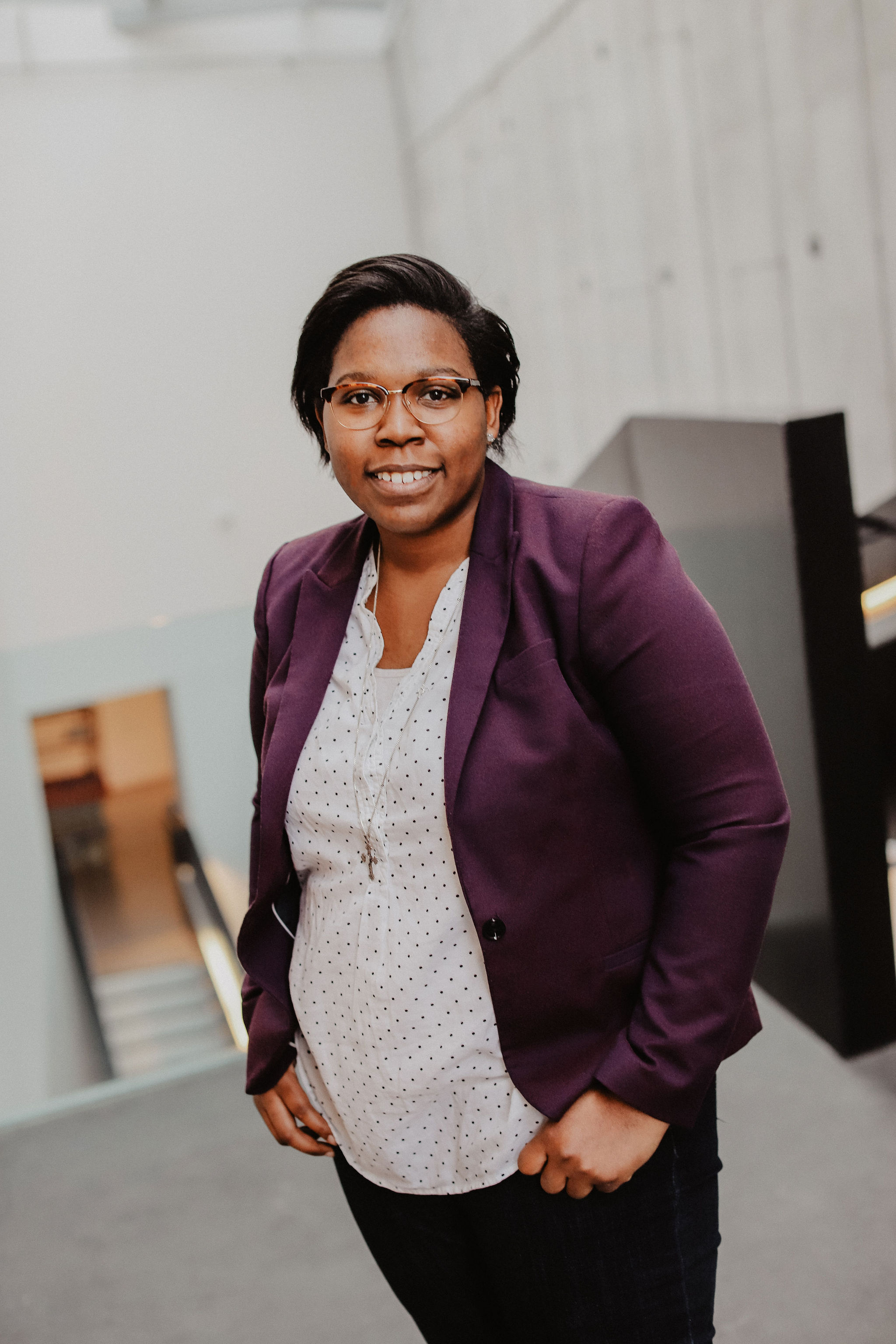 photo of a person standing in an office